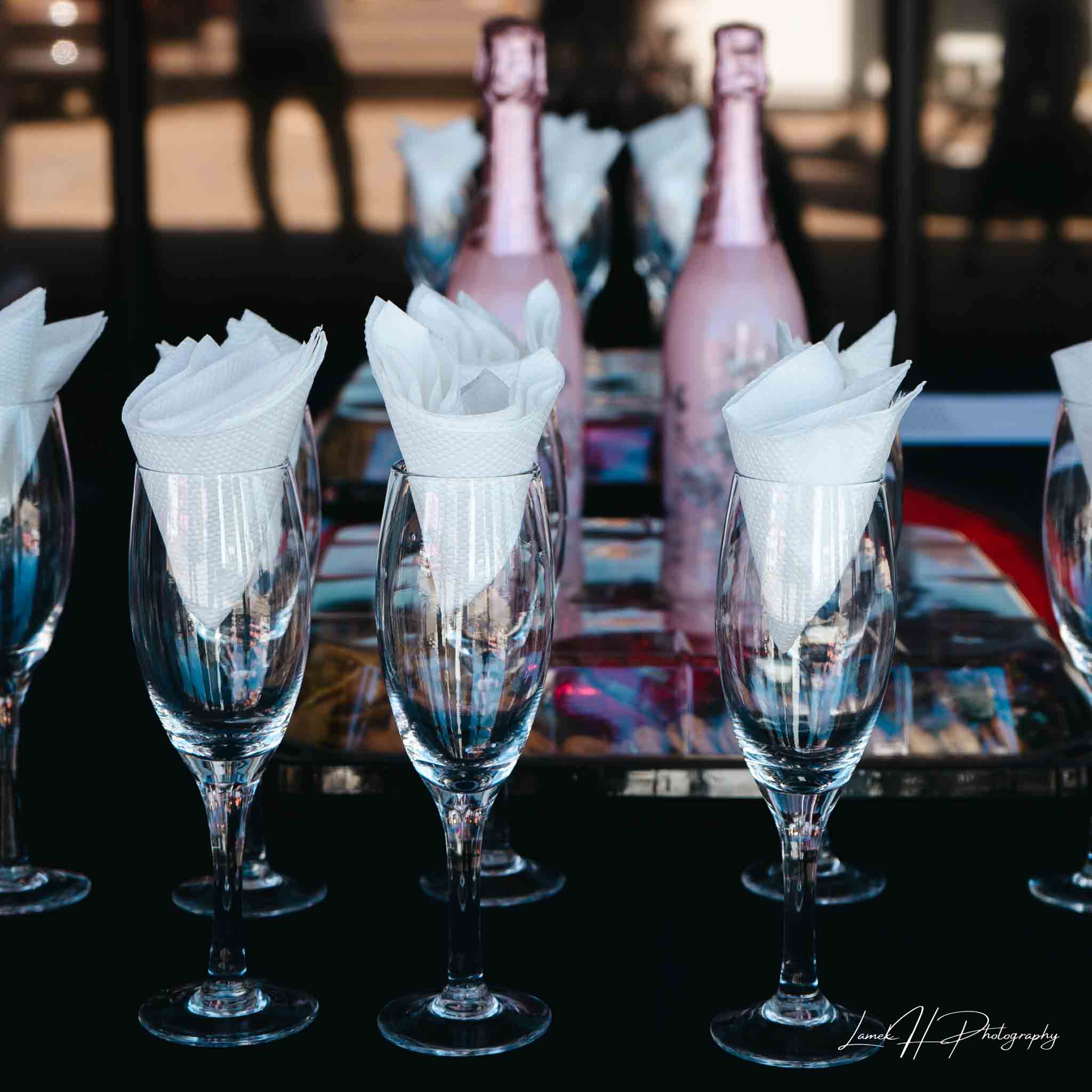 Birthday party celebration with joyful guests raising glasses