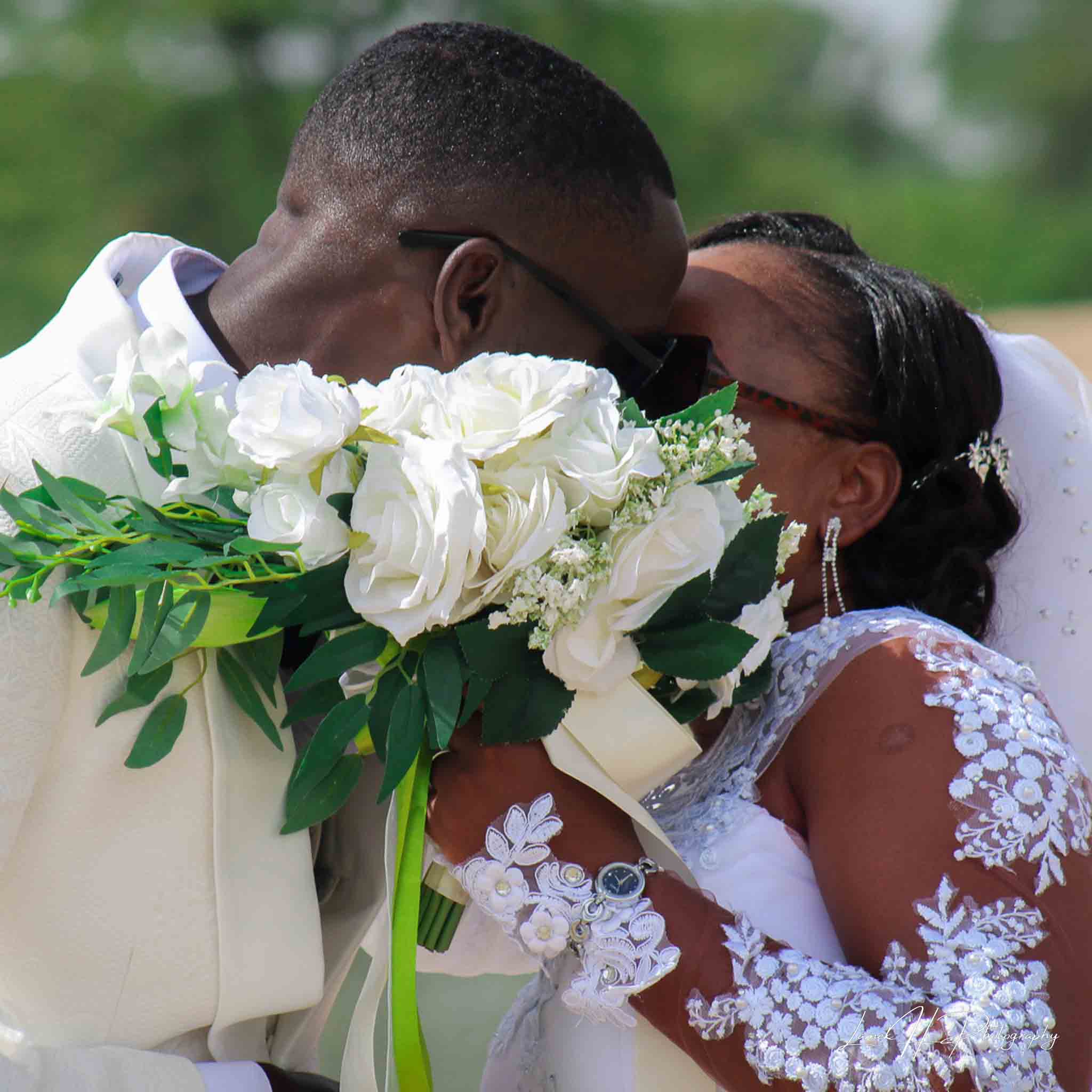 Vibrant event crowd dancing under colorful stage lights
