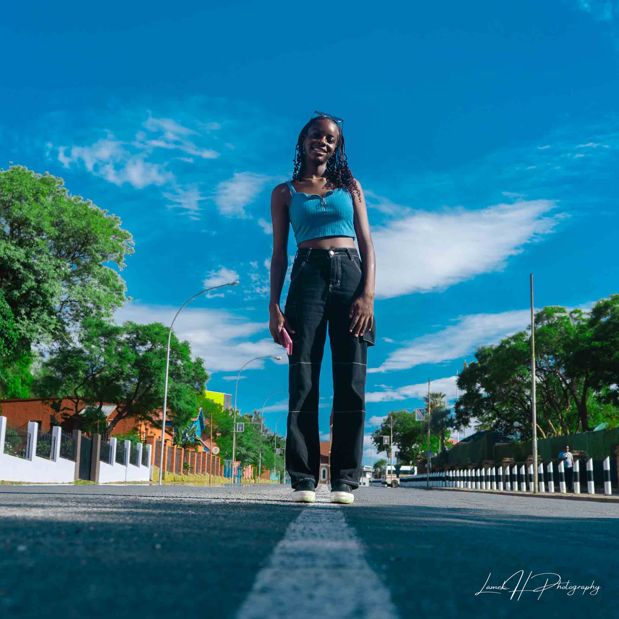 Outdoor fashion shoot with a scenic natural backdrop