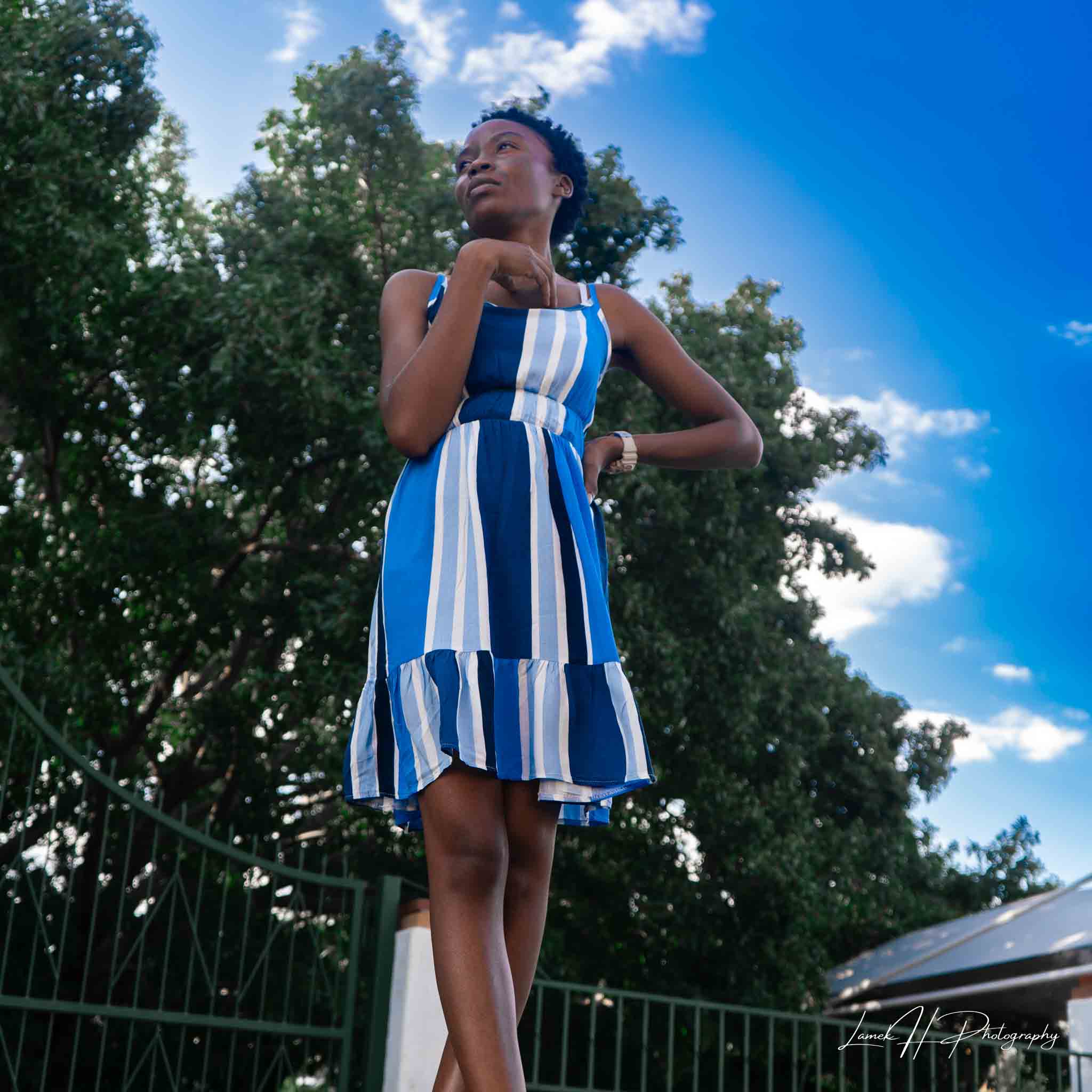 High-fashion editorial shot with bold lighting and contrast