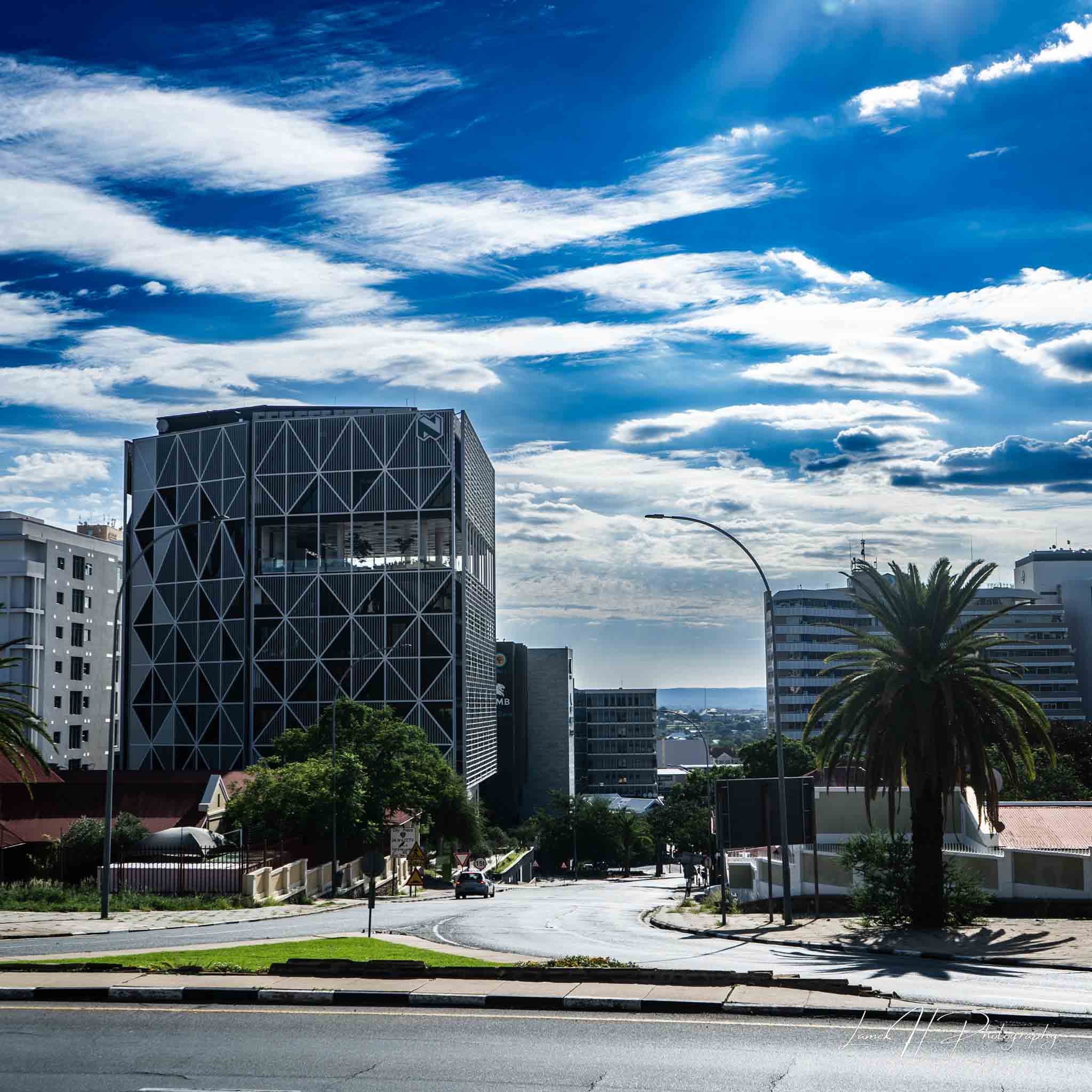 Serene river flowing through lush green valleys