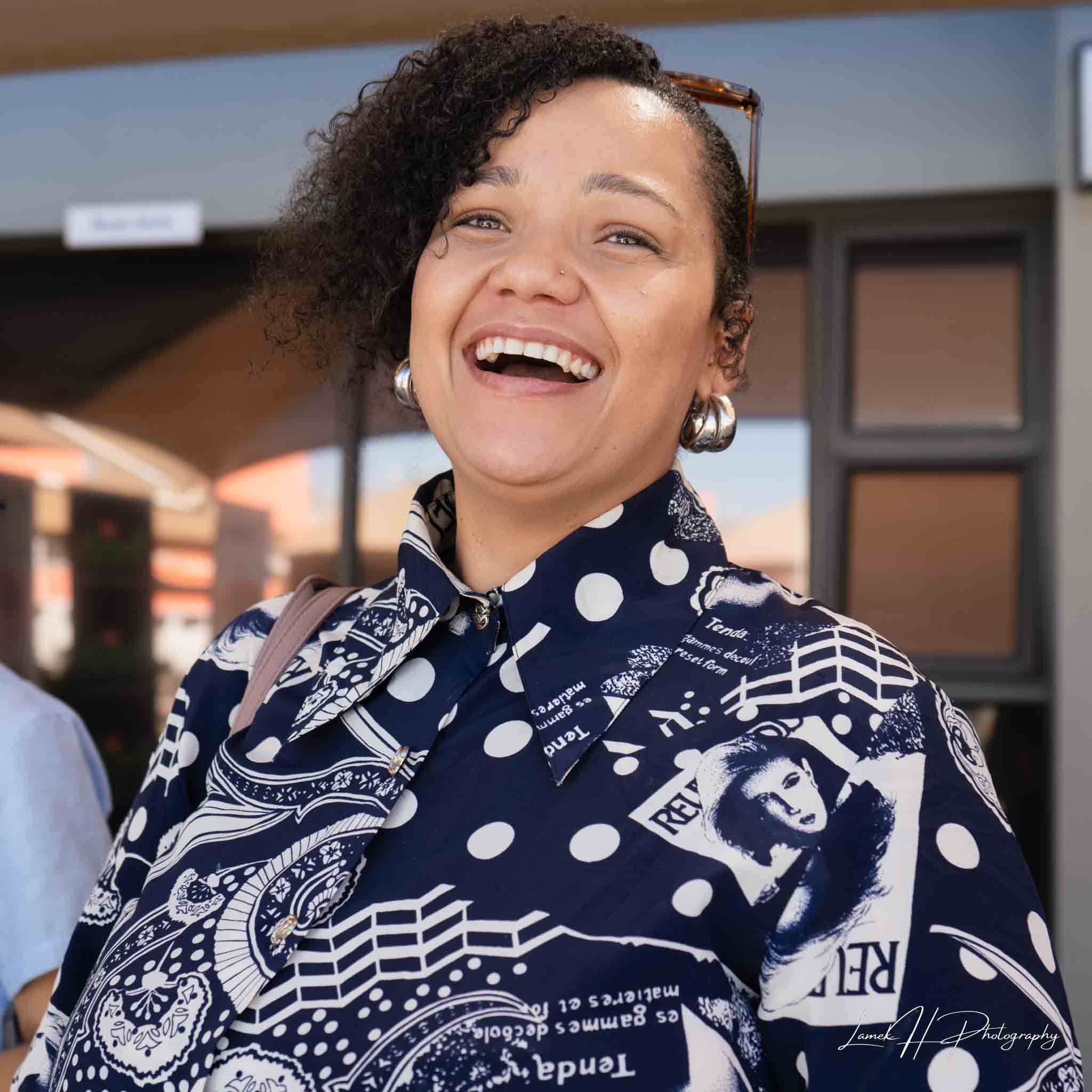 Black and white close-up portrait with dramatic lighting